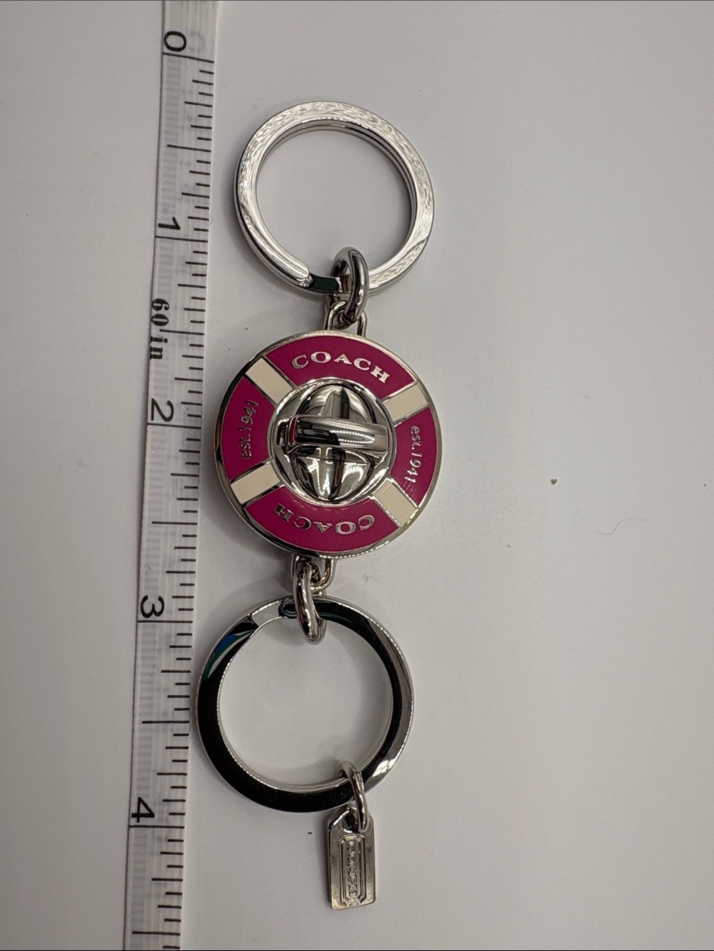 Coach Pink Valet and Silver Lifesaver Charm Keychain